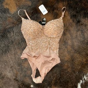 Super Sexy Rose Gold body suit  NWT
